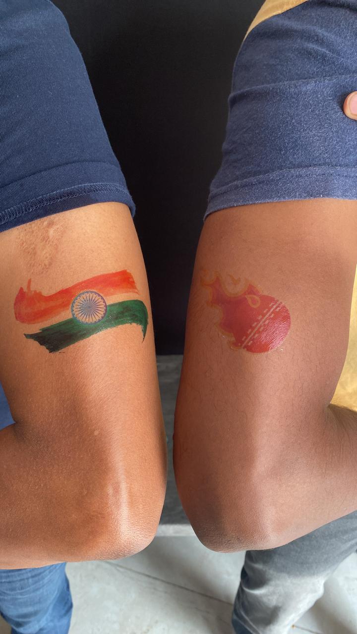 Image of Indian Flag Tattoo Of Tri Colour Painted On Person'S Hand Cheering  And Celebrating Indian Republic Day-RV968164-Picxy